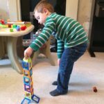 child building magnetic tile tower