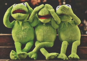 3 kermit the frogs covering eyes, head, and mouth in dismay